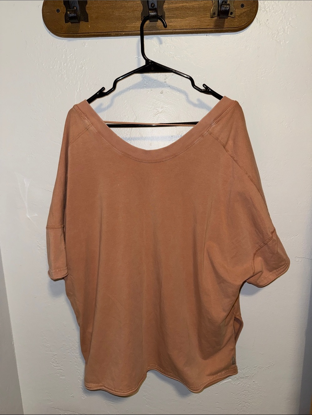 FP Movement by Free People Oversized V-Neck Short Sleeve Top in Dusty Peach - Picture 2 of 6